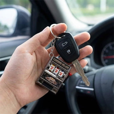 porte clé enforme de machine a sous 